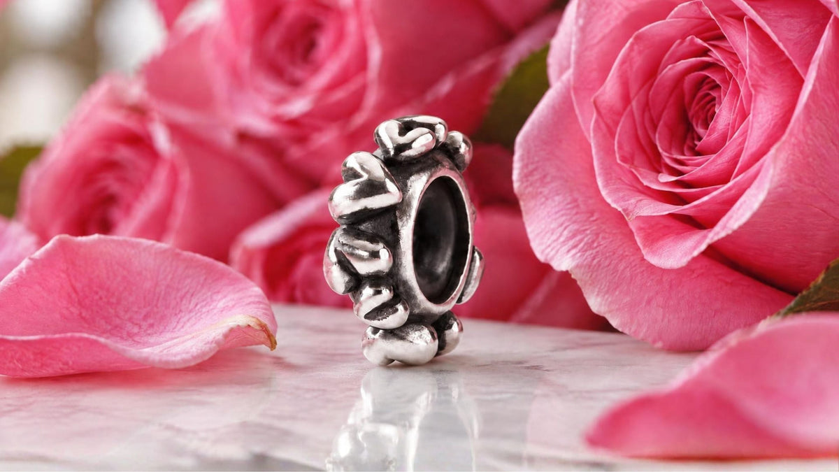 Trollbeads Herzschmuck mit Armreifen und rosa Glas Charms