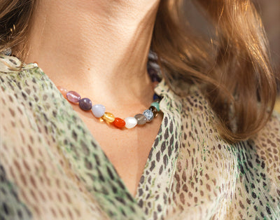 Trollbeads full bracelet on a model holding a flower pot