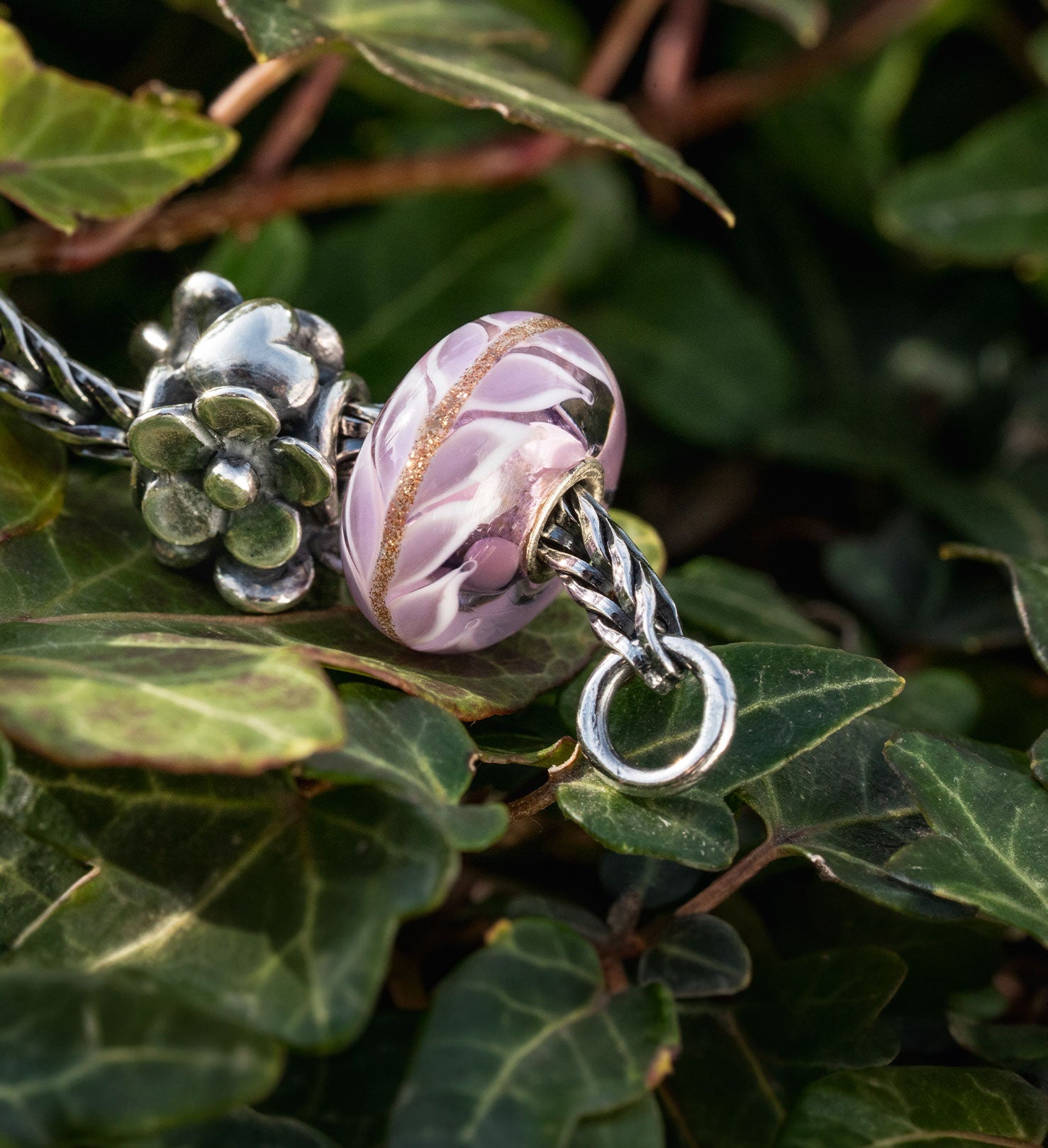 Trollbeads Heartfelt bloom silver bead & Lavender Love glass bead on a bead of leaves